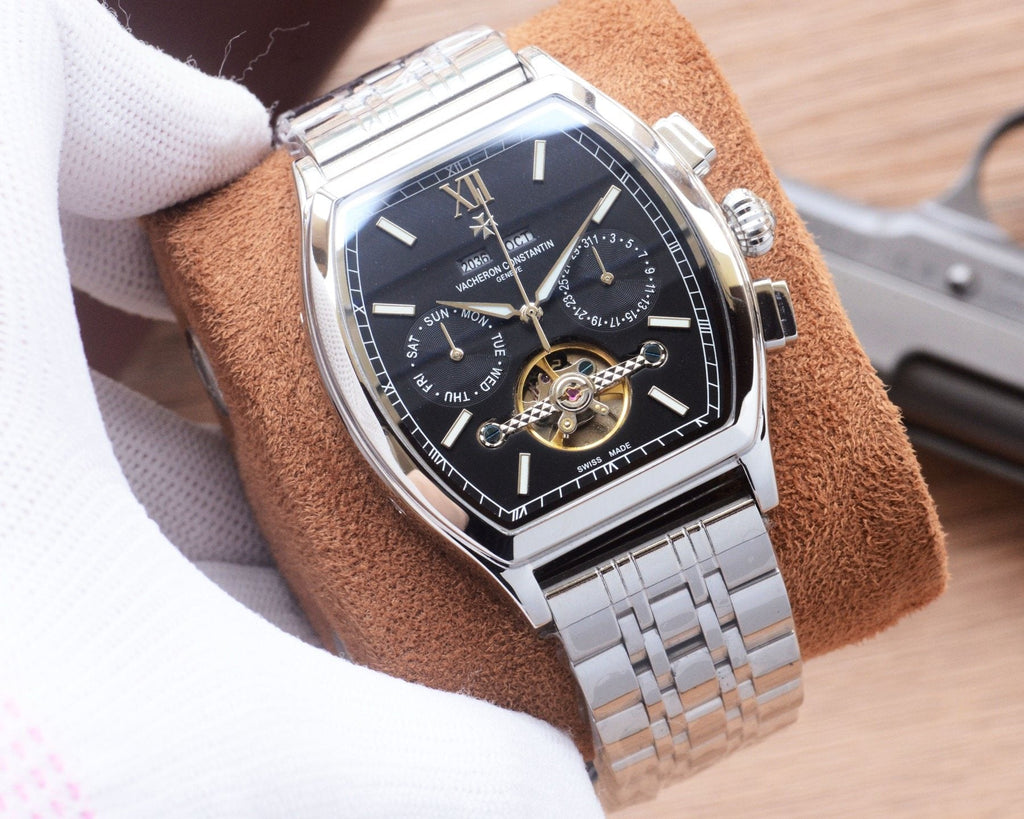Patek Philippe Gold Silver Black Dial Bracelet Watch — hero